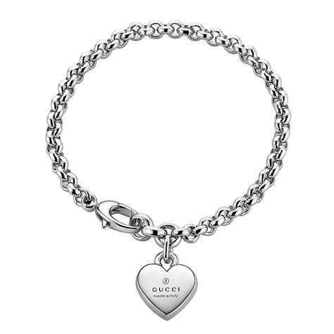 Gucci Sterling Silver Heart Bracelet With Trademark.